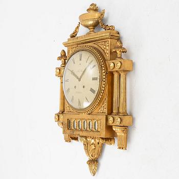 A Gustavian giltwood cartel clock by N. Berg (watchmaker in Stockholm 1751-94).