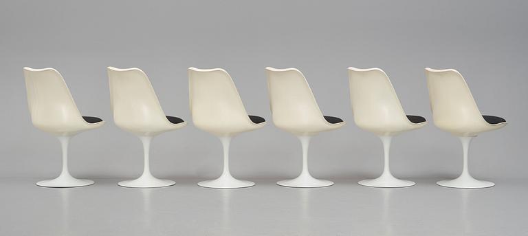 Eero Saarinen, a "Tulip", dining table and 6 chairs, Knoll International, 1960-70's.
