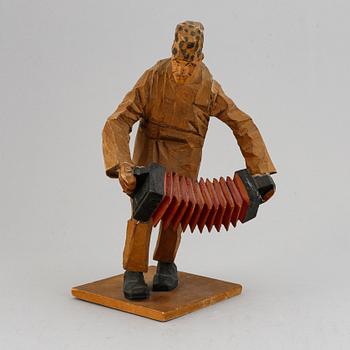 Axel Petersson Döderhultarn, träskulptur. Signerad. Höjd 27 cm.