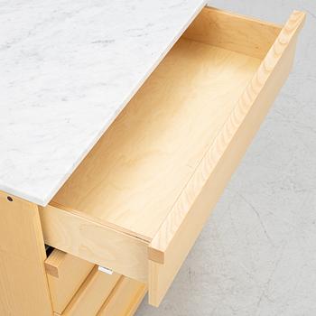 A contemporary chest of drawers.