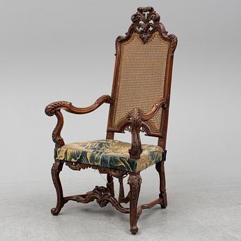 A 19th century baroque style armchair.