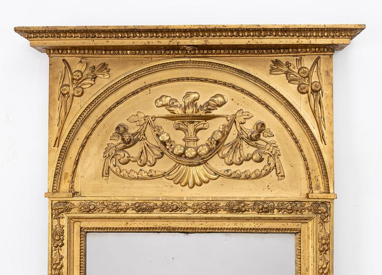 Empire, A late Empire mirror, first half of the 19th century.