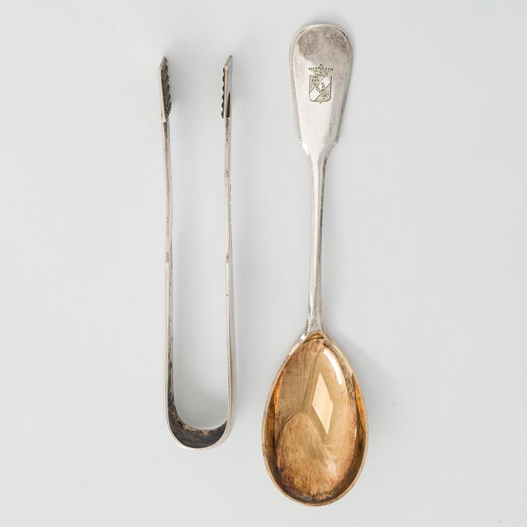 A set of two 1920s-1930s silver sweetmeat basket with sugar tong and jam spoon, Uusi Kultaseppä Oy, Helsinki, Finland.