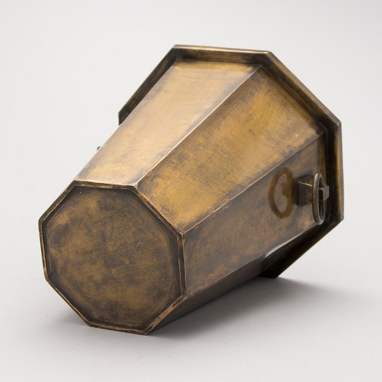 A patinated brass champagne bucket from the first half of the 20th Century.