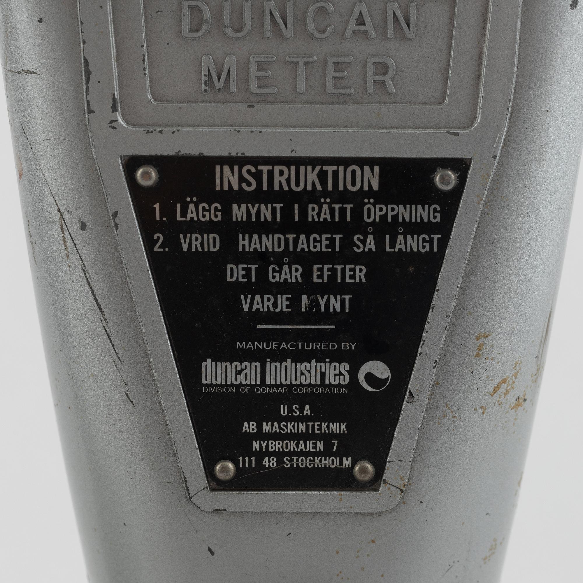 Parking meters, a pair, "Duncan Meter", Duncan Industries U.S.A, second half of the 20th century.