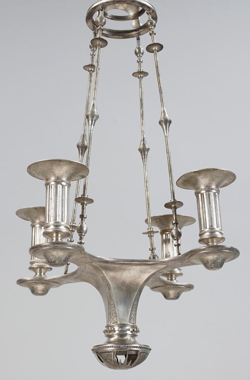 A Ferdinand Boberg four light pewter chandelier, Santesson's tenngjuteri, Stockholm 1905.