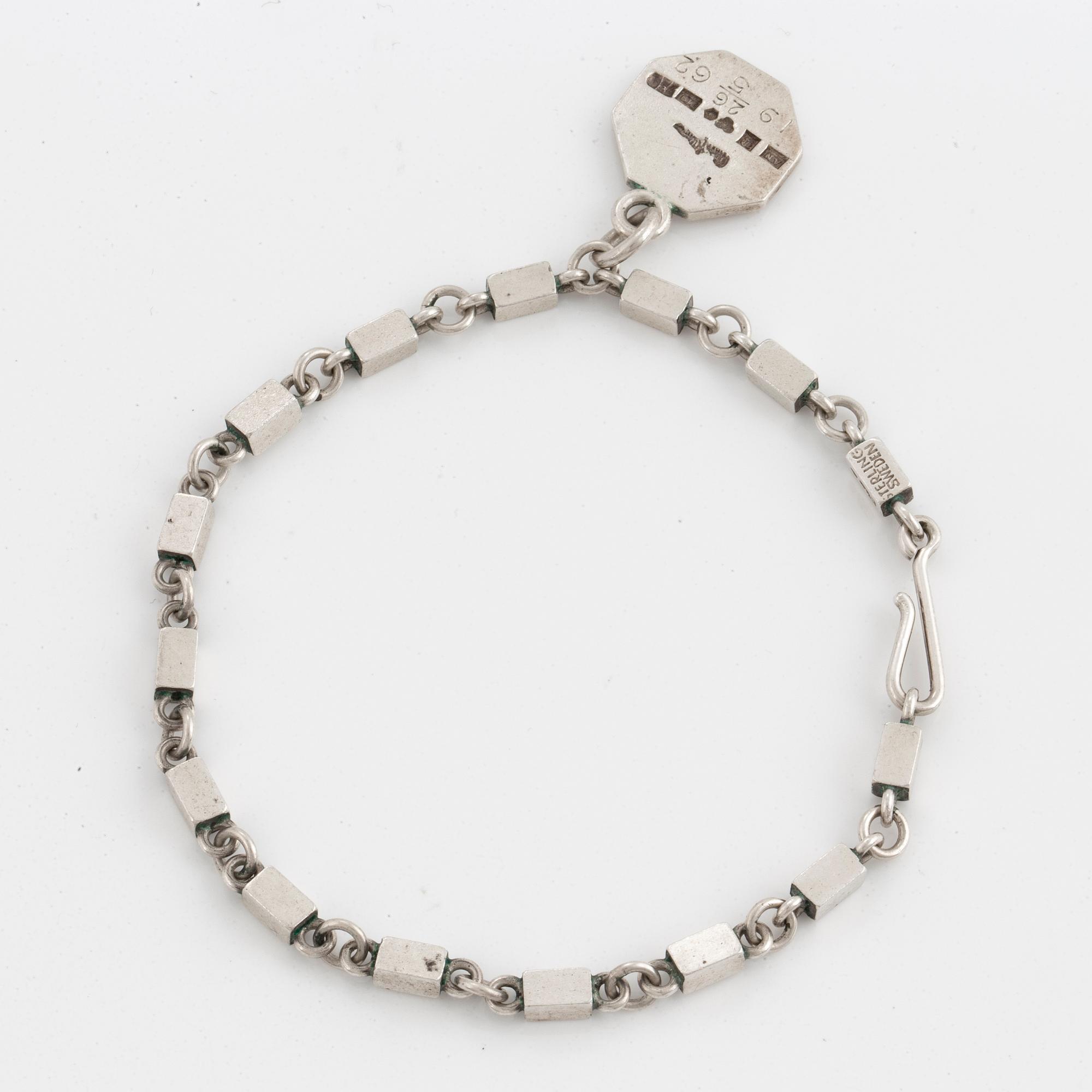 WIWEN NILSSON, silver bracelet with charm.