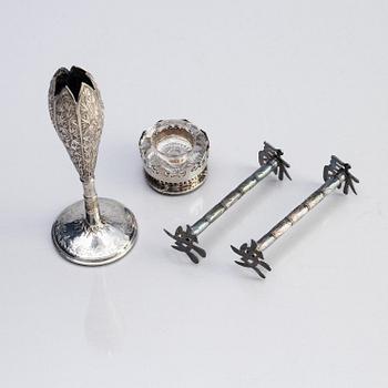 A silver bud vase, two stands for the butter knifve and a salt, China, early 20th Century.