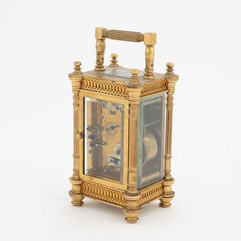 A brass carriage clock, Duverdrey & Bloquel, France, around the year 1900.