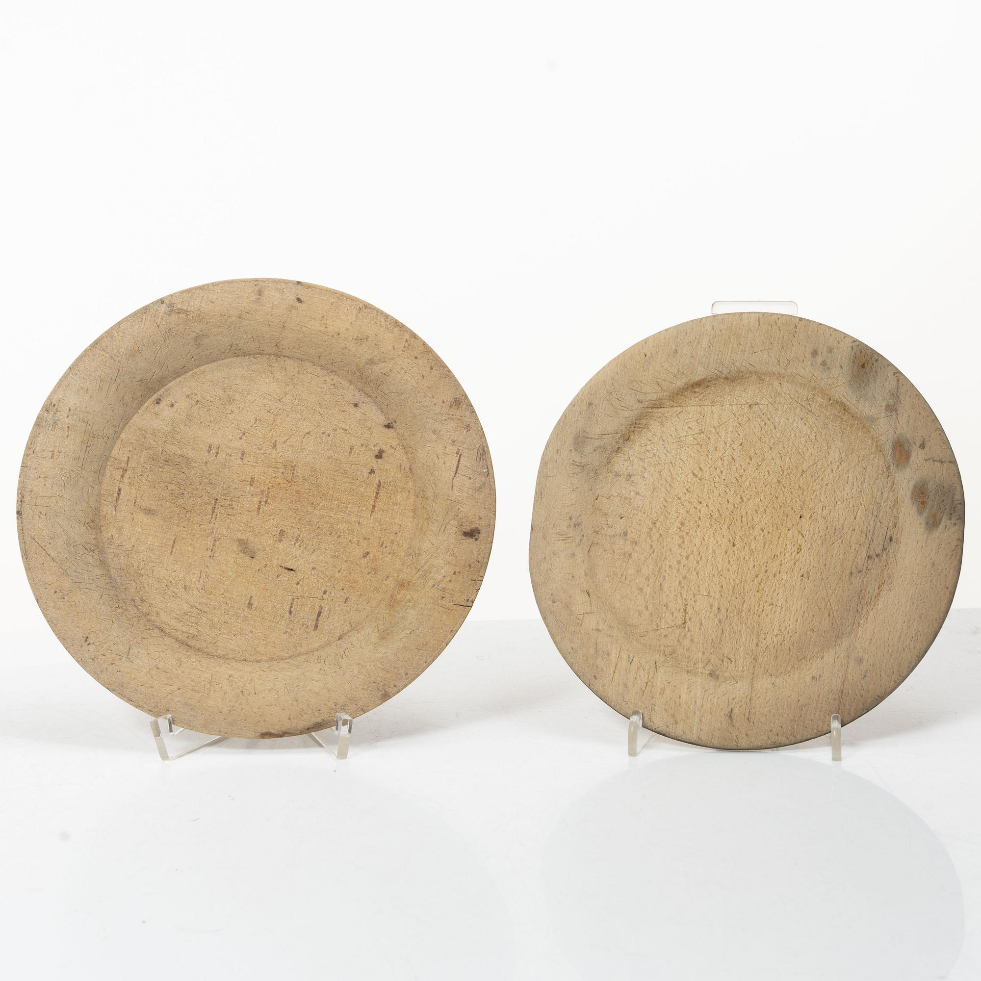 Twelve wooden plates, 19th Century.