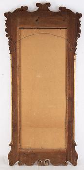 A late 19th century bronzed mirror.