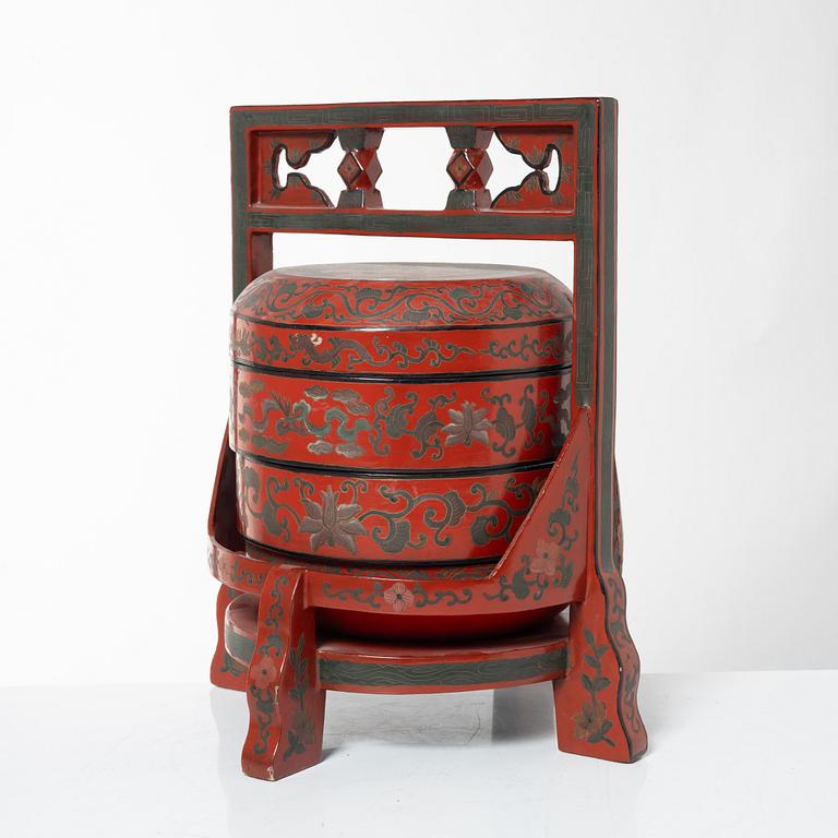 A group of three red wooden vessels, China/Southeast Asia, 20th century.