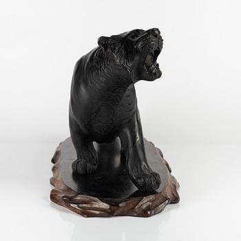 A Japanese bronze sculpture of a tiger, 20th Century.