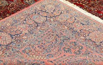 A semi-antique so called American Sarouk carpet, c. 450 x 303 cm.