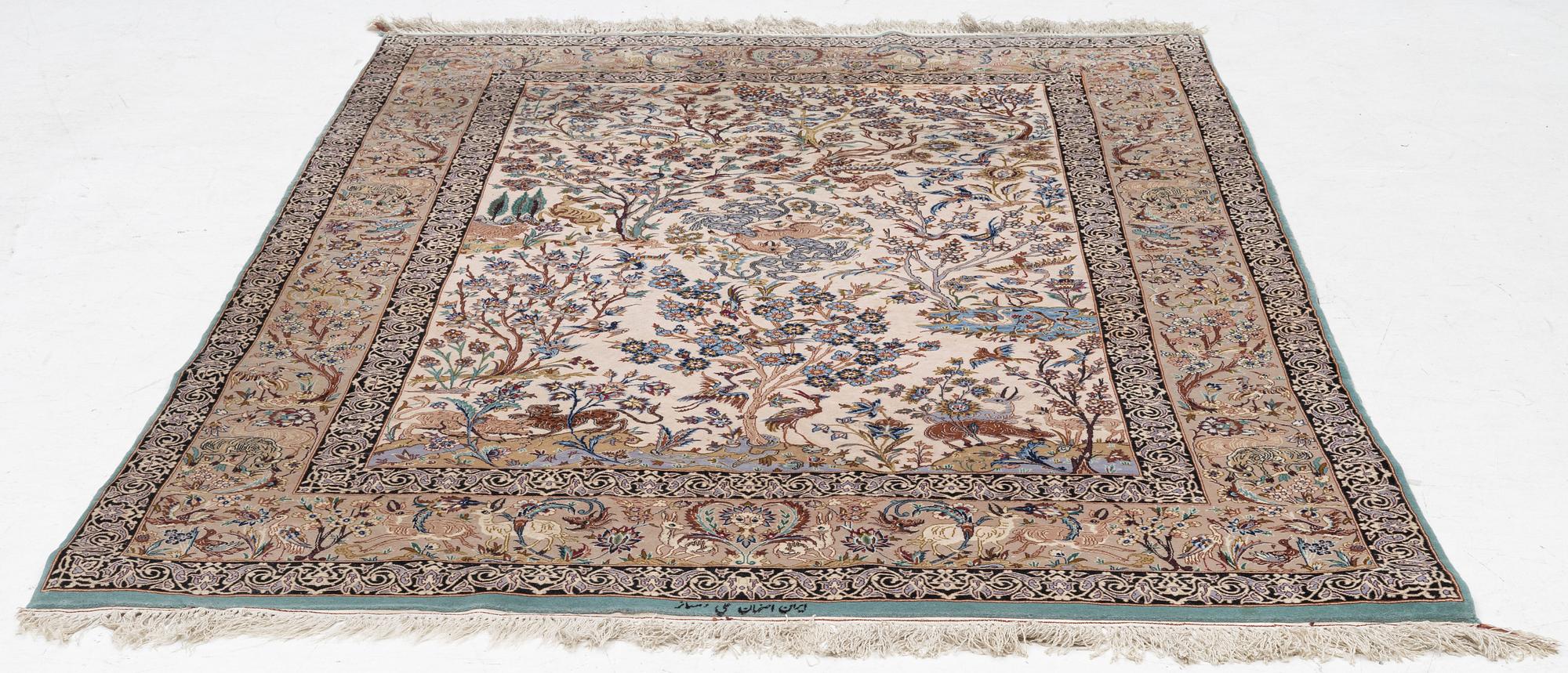 A signed pictoral Isfahan rug, Central Persia (Iran), signed, c. 235 x 154 cm.