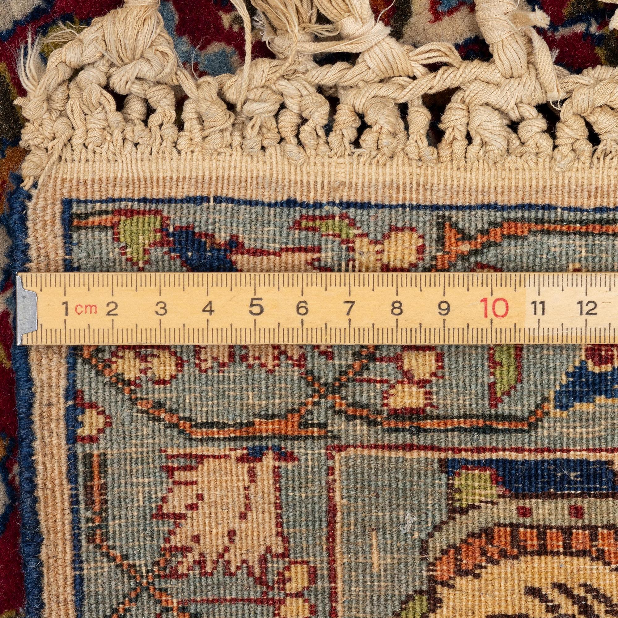 A semi-antique pictoral Tabriz rug, Northwest Persia, c. 200 x 136 cm.