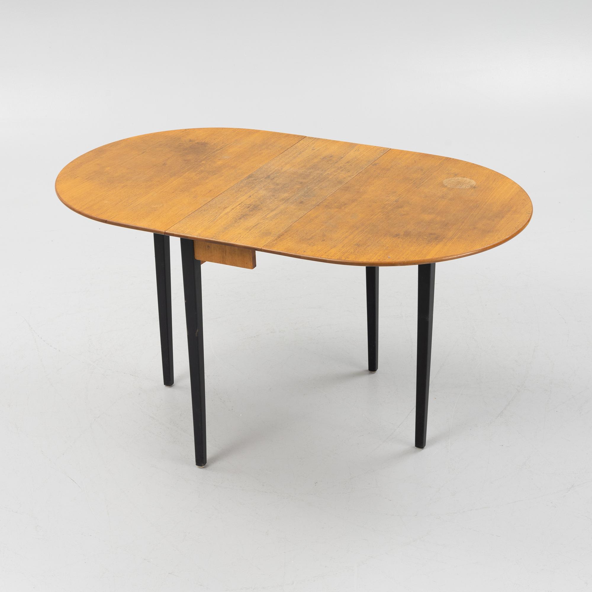 A gate-leg table, mid 20th Century.