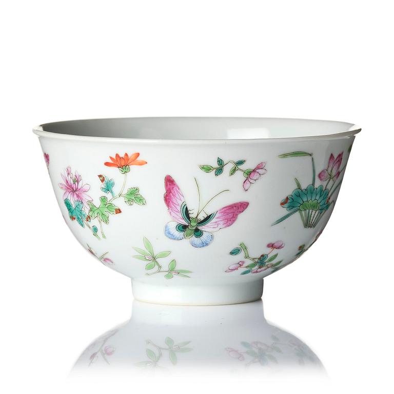 A famille rose 'butterfly' bowl, Qing dynasty with Daoguang mark and of the period (1820-1850).