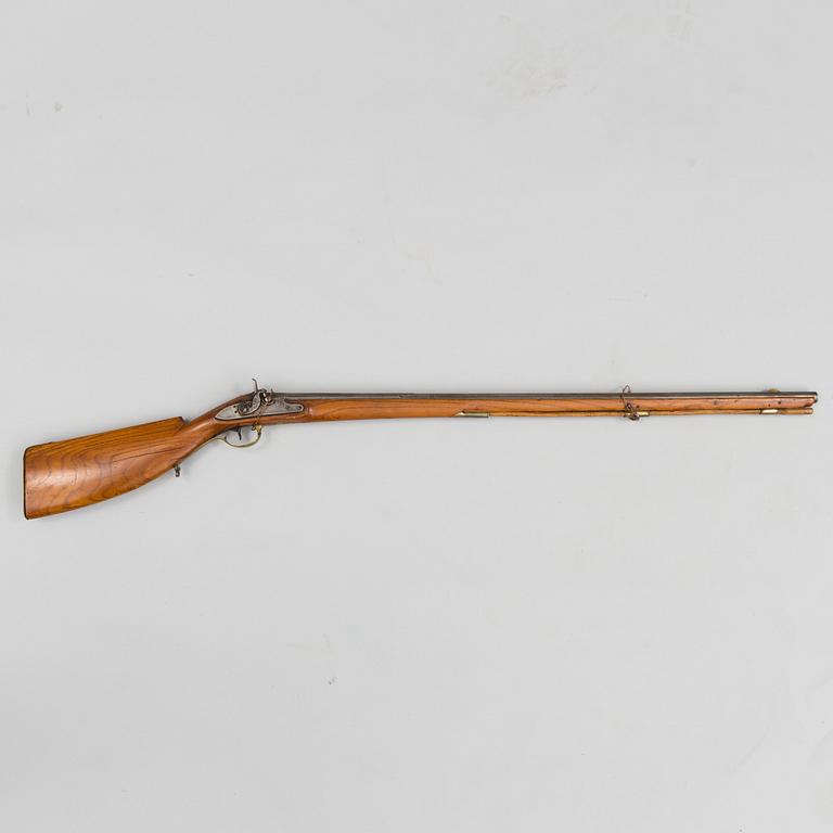 An 18th century percussion gun.