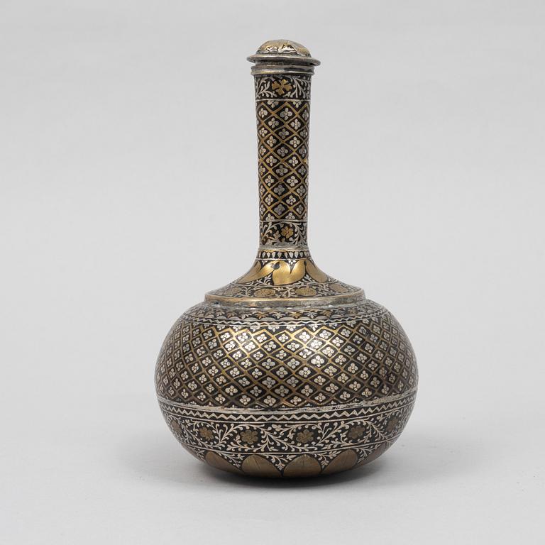 An Indian bidri flask, zinc alloy with white metal and brass inlay, around 1900.