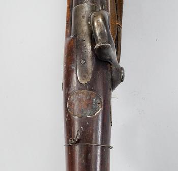 A Swedish 19h Century percussion rifle made by Carl Gustaf stads gevärsfaktori, dated 1851. With bayonet.