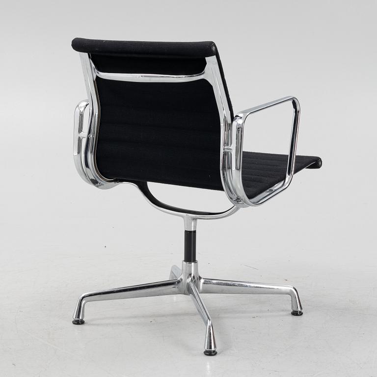 Charles and Ray Eames, an EA 108 aluminum swivel armchair from Vitra.
