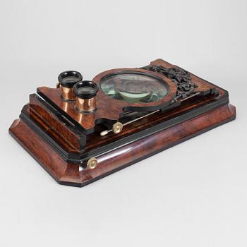 A table mounted stereoscope ca 1900.