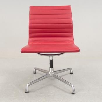 An Aliminium Group chair, model EA105 by Chales and Ray Eamed, produced by Vitra.
