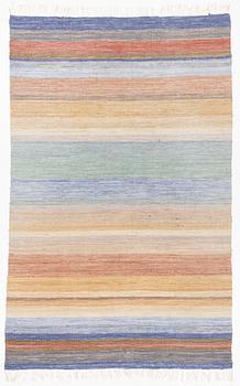 A rag rug, c. 300 x 195 cm.
