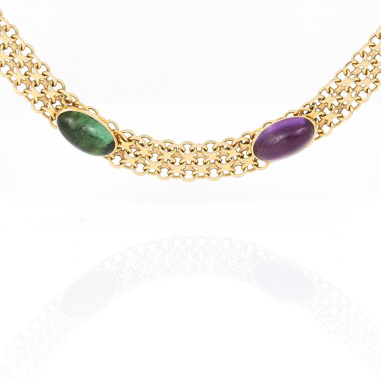 ARMBAND, 18k guld med cabochonslipade turmaliner och ametister, Stockholm, 1963. Vikt ca 23g.