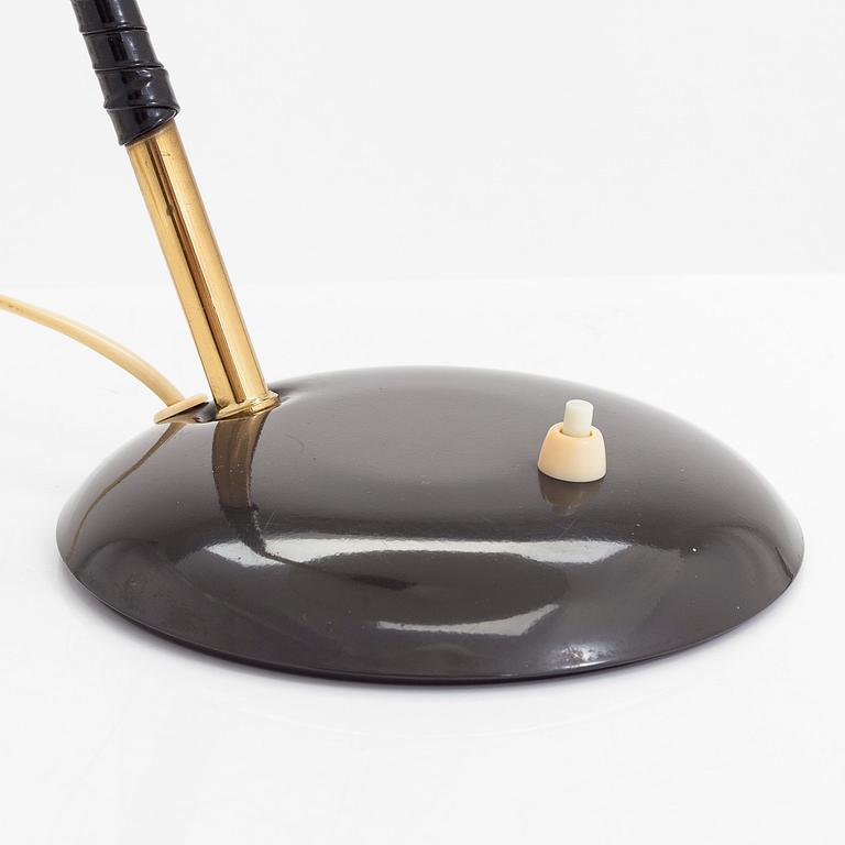 A mid 20th- century tamble lamp for Valinte.