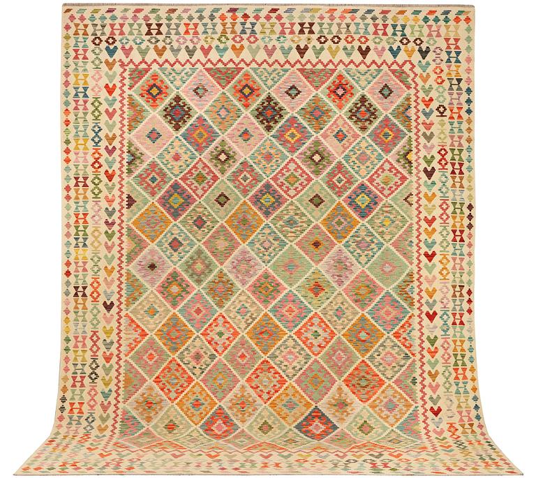 A Kilim carpet, c. 390 x 306 cm.