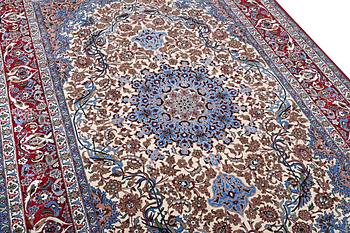 An Esfahan carpet, part silk, c. 243 x 158 cm.