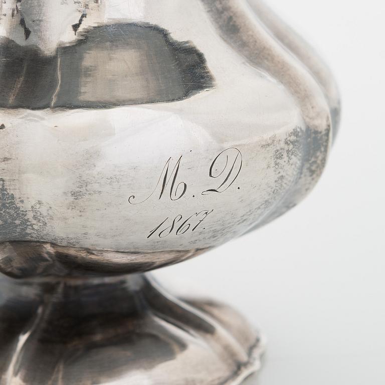 A silver cream jug, maker's mark of Michael Takkinen, St. Petersburg 1856.
