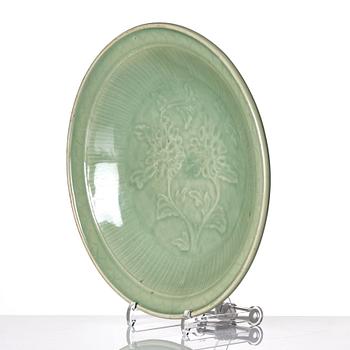 A large celadon glazed dish, Ming dynasty (1368-1644) or later.