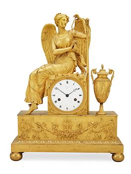 701. A French Empire early 19th century gilt bronze mantel clock.