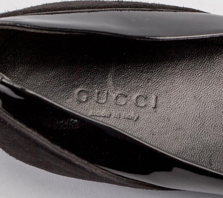 SKOR, Gucci.