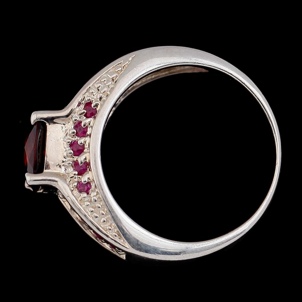RING, sterlingsilver, rubin och safirer. Vikt ca 8,9 g.