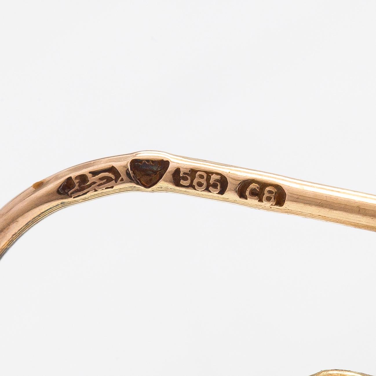 Liisa Vitali, Örhängen "Leppäkerttu", 14K guld. Kultakeskus, Tavastehus 1980.