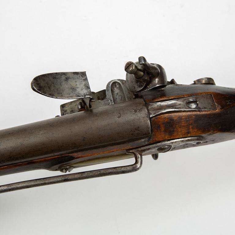 An 18th century flintlock carbine.