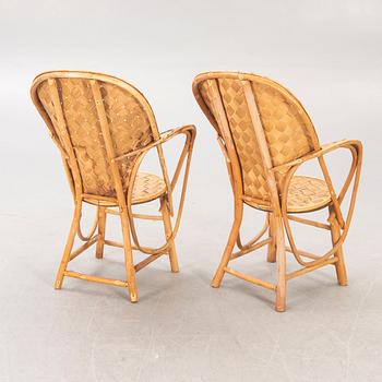 A pair of Pascal Raffier "Le Corbusier" chestnut chairs France late 20th century.