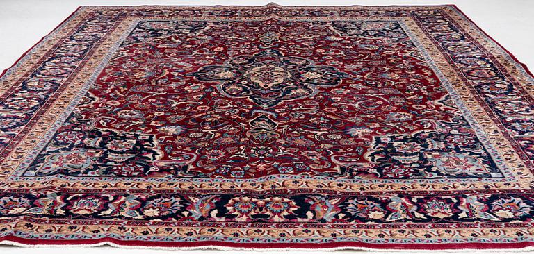 A oriental carpet, c. 375 x 290 cm.