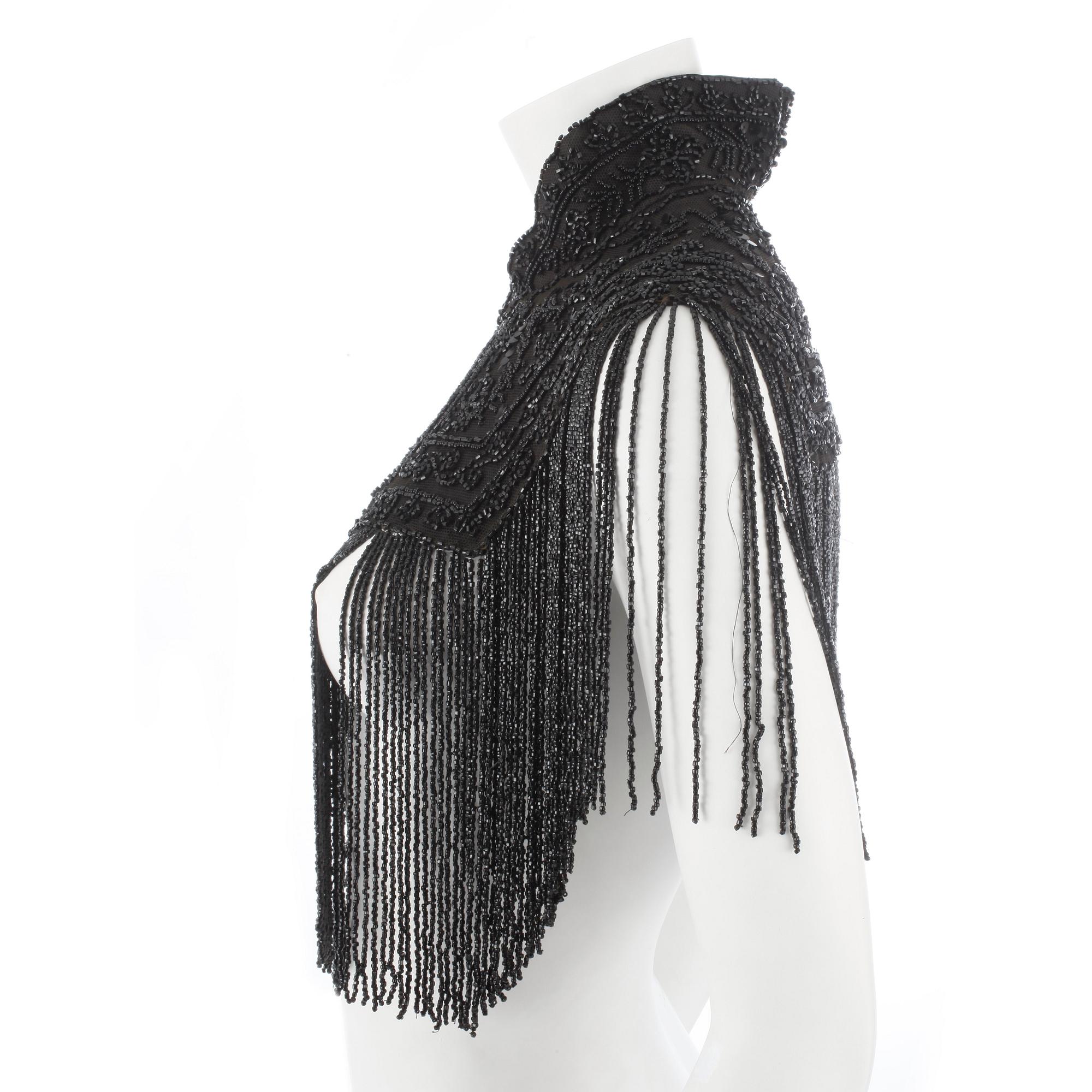 COLLAR, black silk with extensive beading, late 19th/early 20th century.