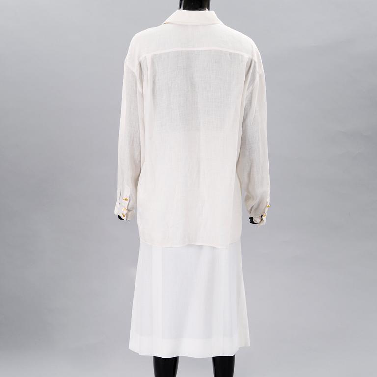 A White Linnen Blouse and a Skirt.