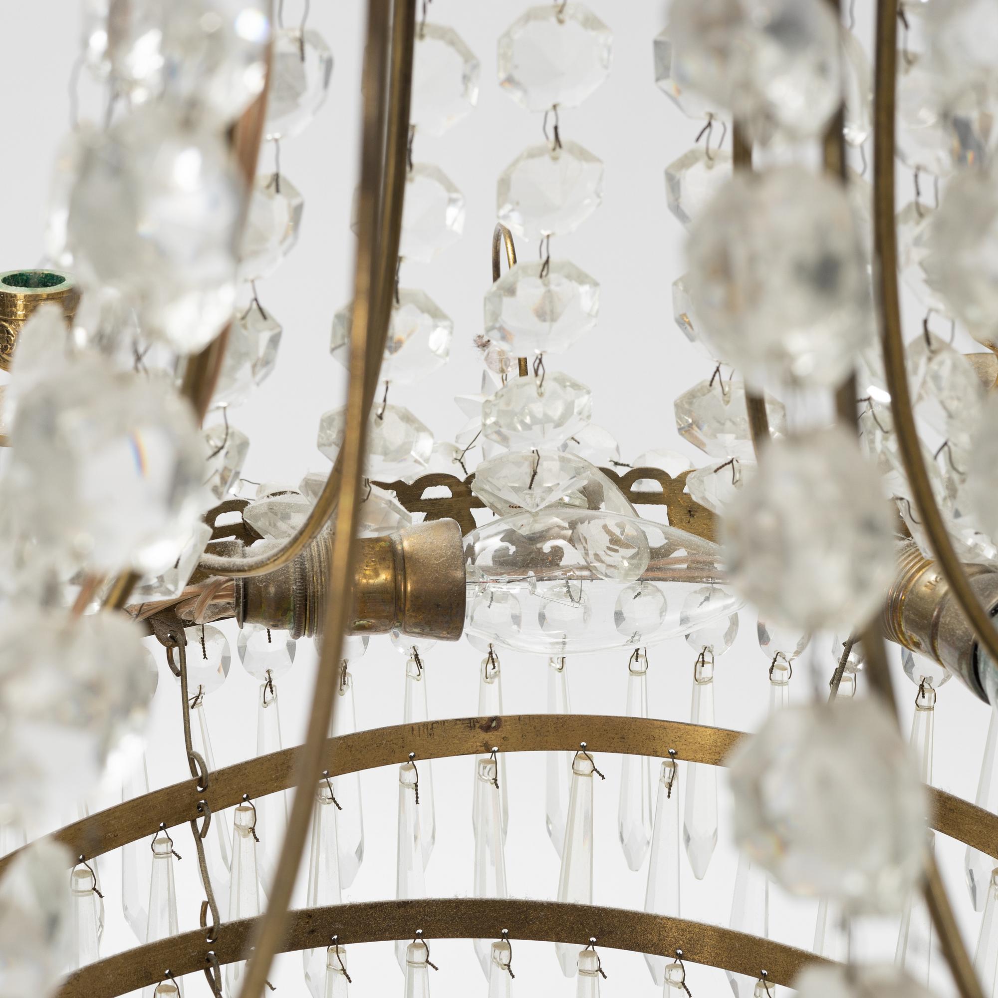 An Empire style chandelier, later part of the 20th Century.