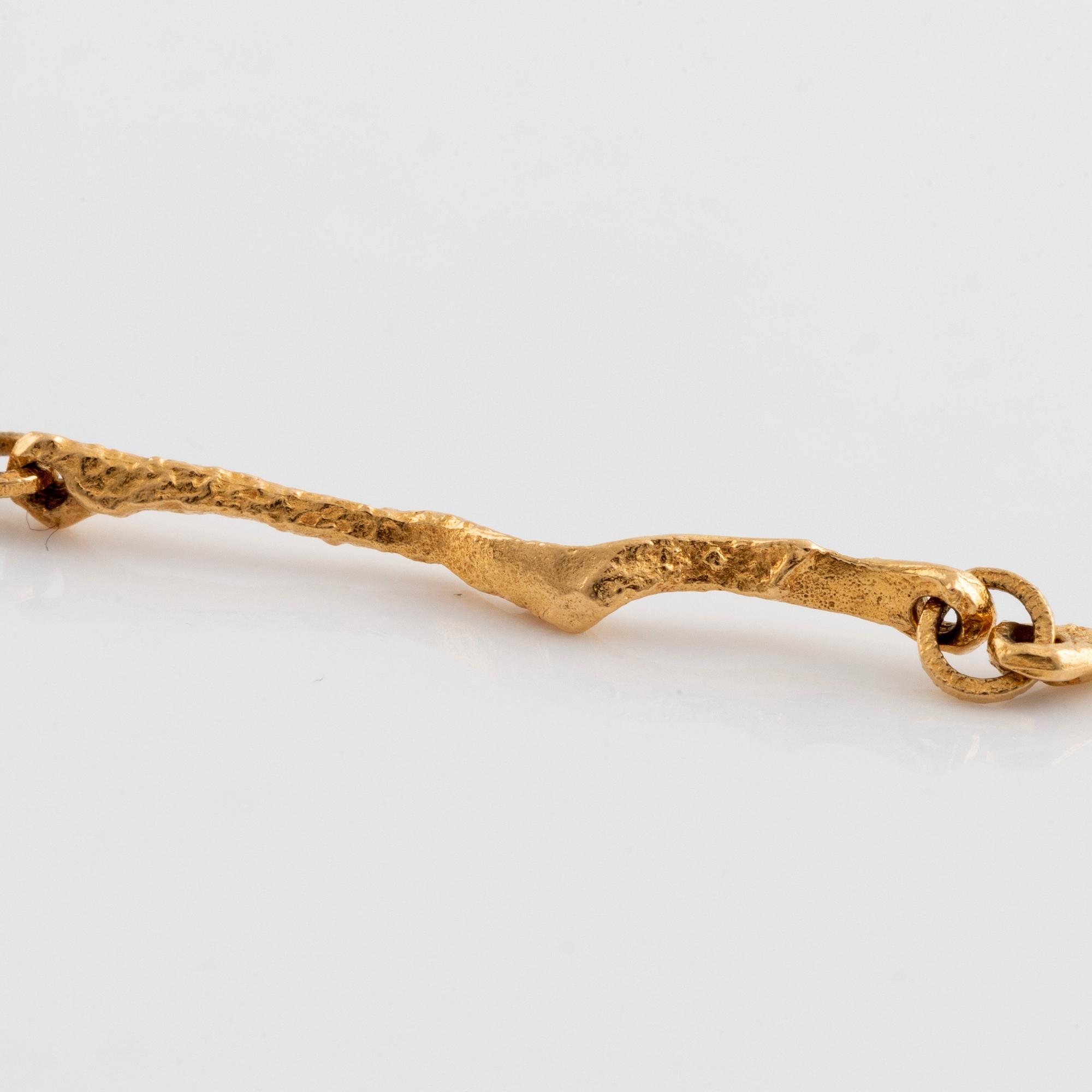 Björn Weckström, hänge/urgömma 18K guld" Sun Dial".