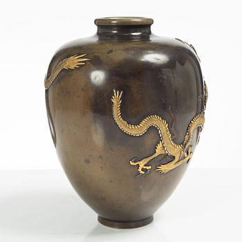 A Japanese gilt bronze and silvered dragon vase, Meiji period (1868-1912). Signed.