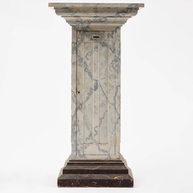 A Swedish column-shaped cabinet late 19 th century.