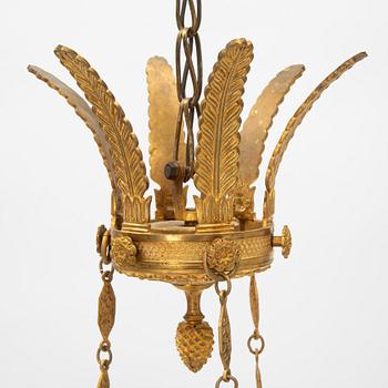 A presumably Italian Empire six-light ormolu chandelier, early 19th century.
