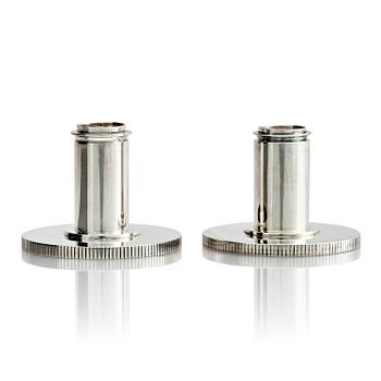 525. Georg Jensen, a pair of sterling silver candlesticks, design by Sigvard Bernadotte, model no 711A, Copenhagen, Denmark after 1945.